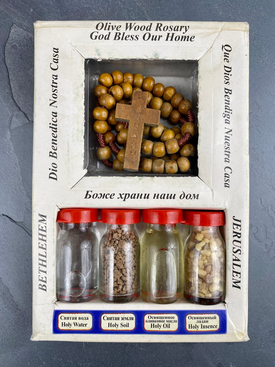 This Holy Box Set from Jerusalem contains Pure Water from the Jordan River, Genuine Earth From Jerusalem, Holy Olive Oil from Bethlehem, Incense and Olive Wood Rosary Cross from the Holy Land. HB20221